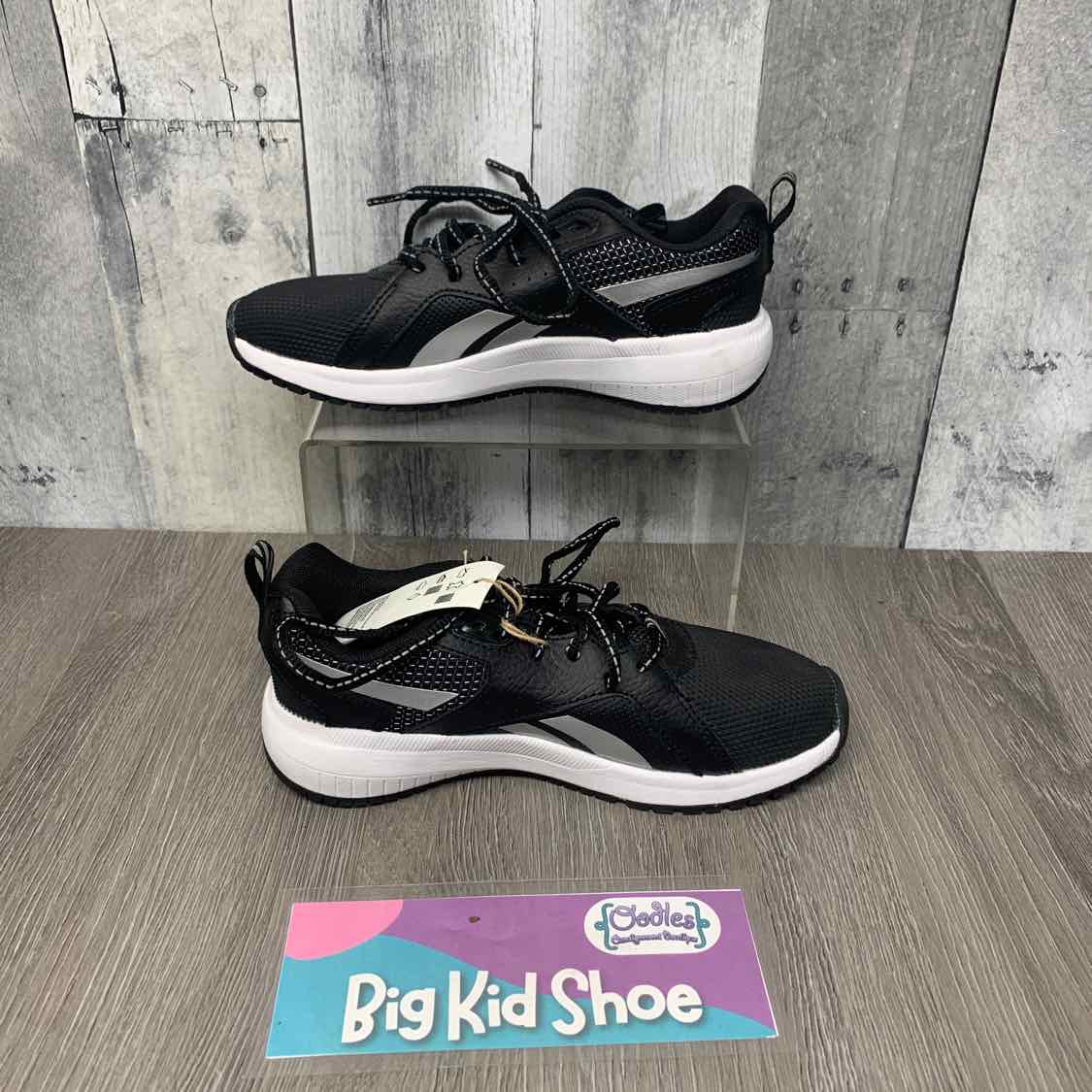 Size 2 Black/White Reebok Sneakers