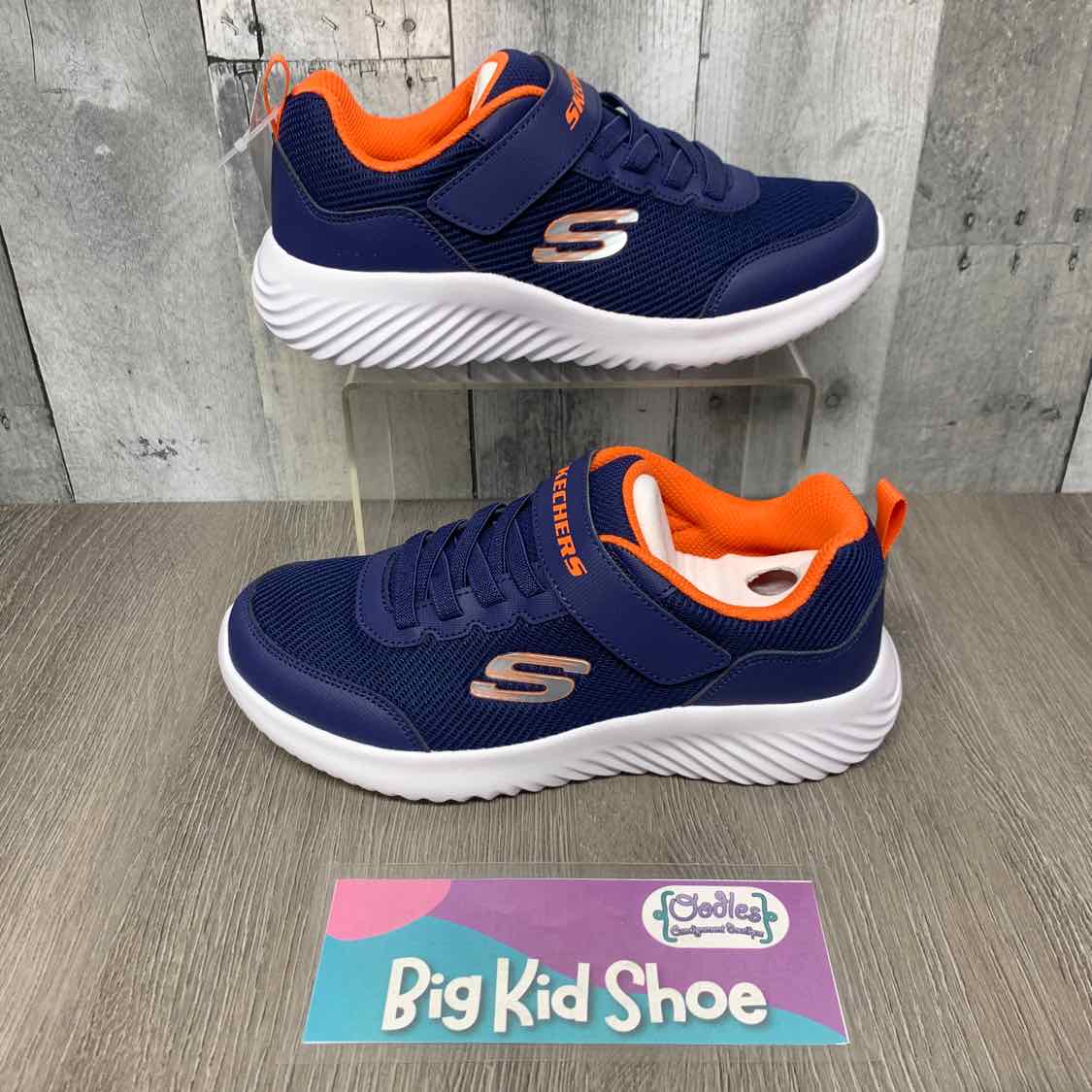 Size 4 Navy/Orange Skechers Sneakers