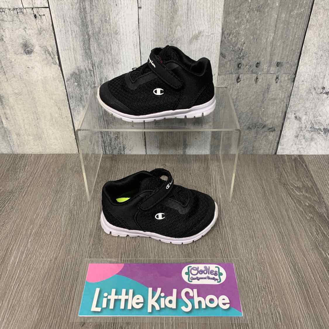 Size 4 Black/White Champion Sneakers