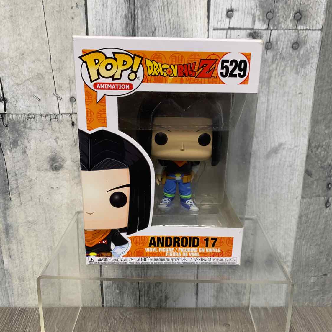 Funko Pop Orange/Black Action Figure