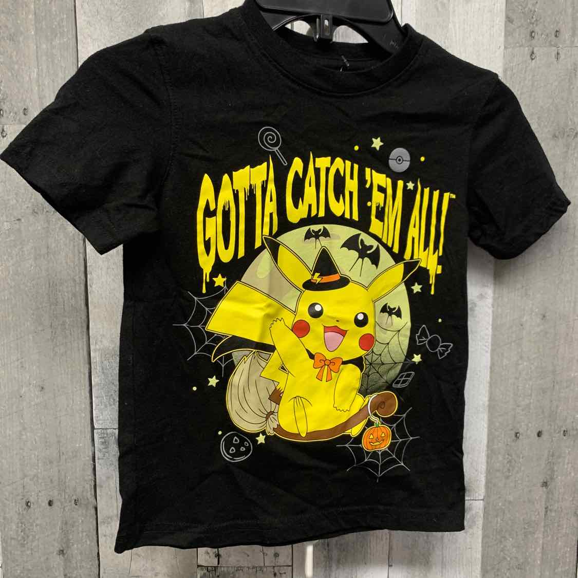 Size 4/5 Black/Yellow Pokemon T Shirt