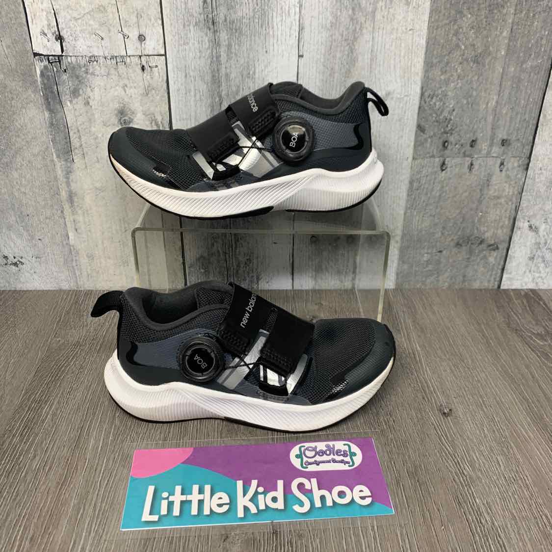 Size 12 Black/White New Balance Sneakers
