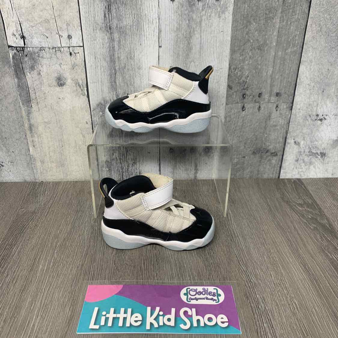 Size 5 Black/White Sport Brand Sneakers