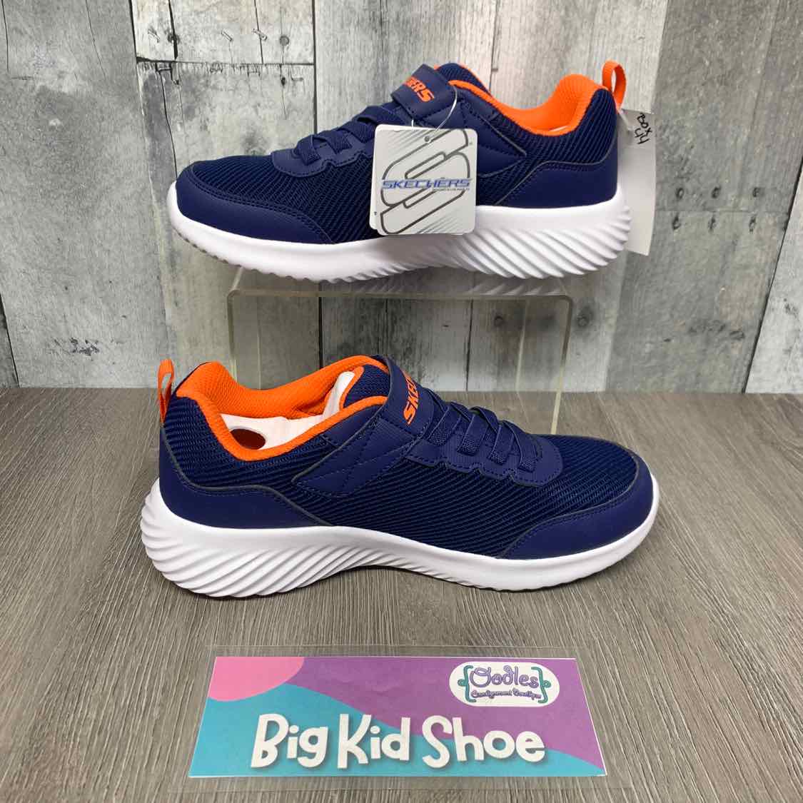 Size 4 Navy/Orange Skechers Sneakers