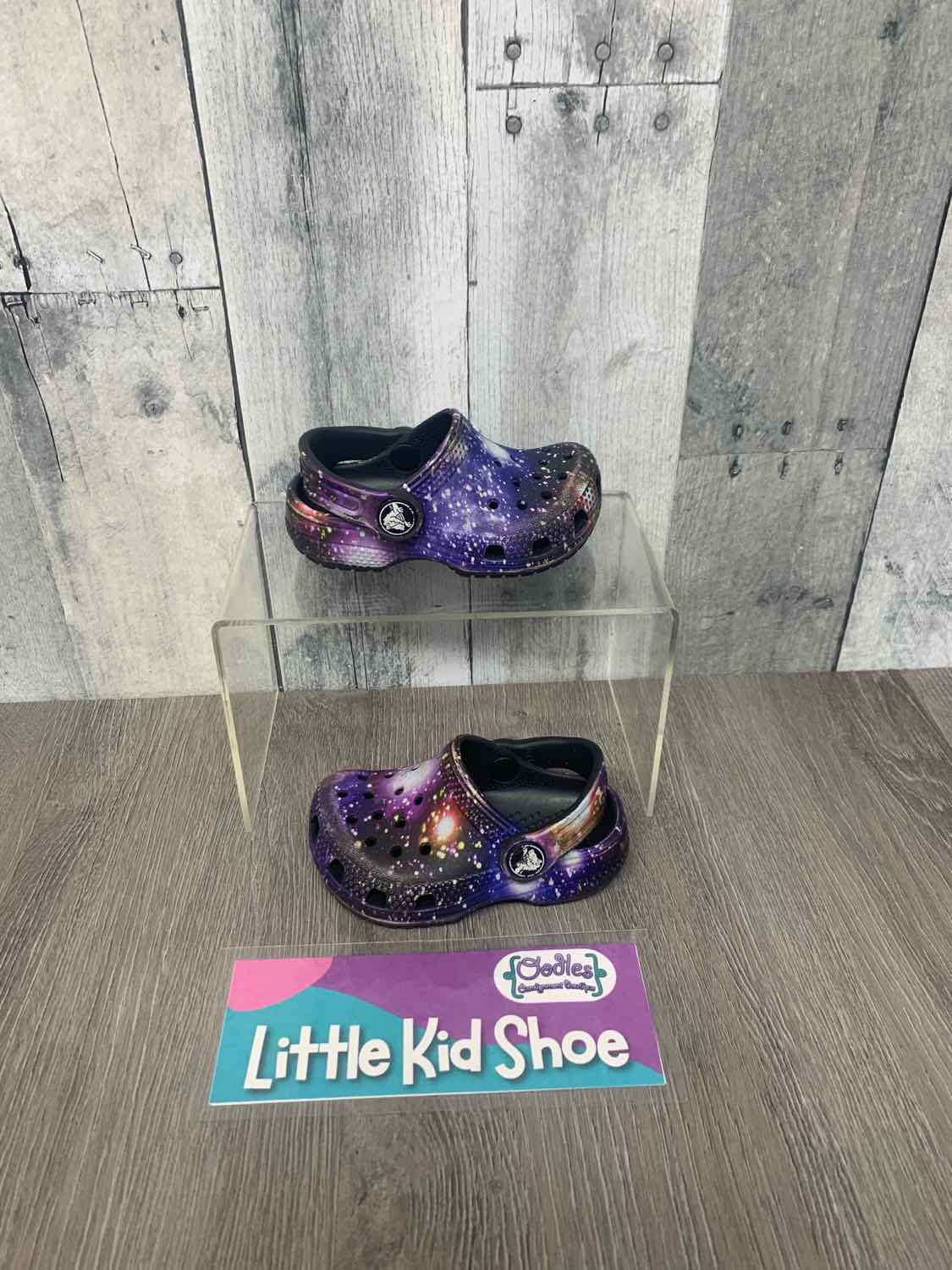 Size 5 Black Graphic Crocs Water Shoes - OodlesCB