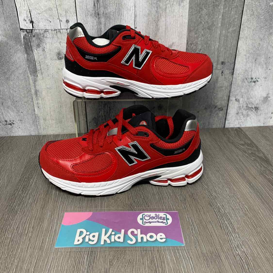 Size 6 Red/Black New Balance Sneakers