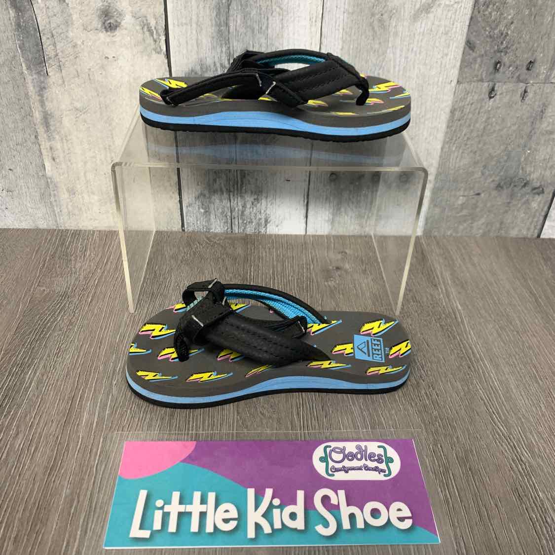 Size 7/8 Gray/Yellow Reef Sandals