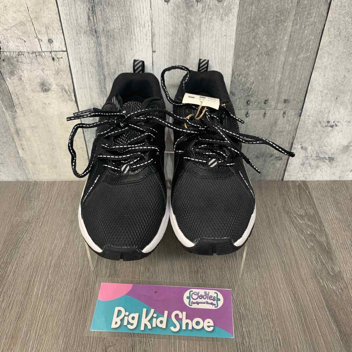 Size 2 Black/White Reebok Sneakers