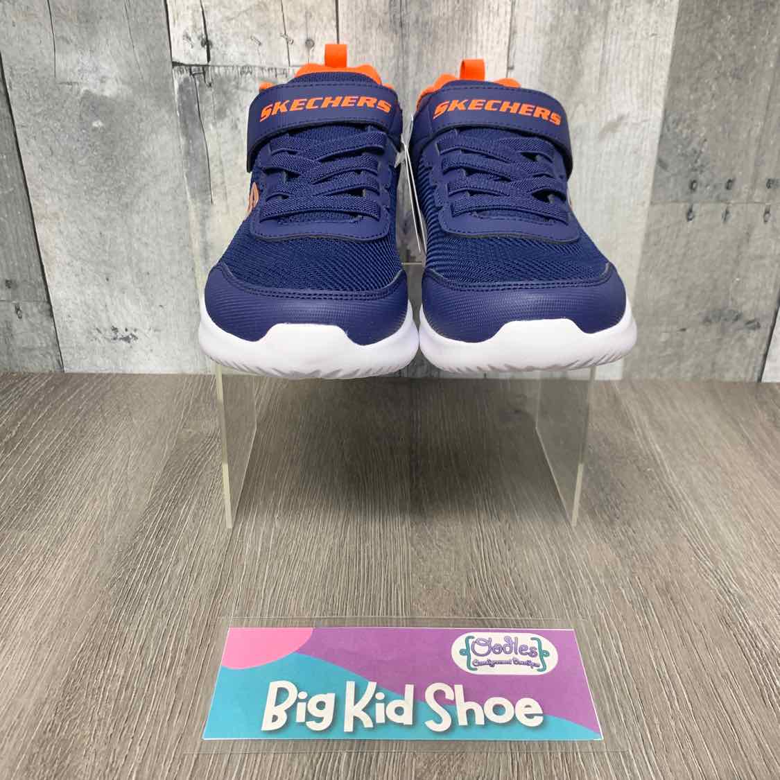Size 4 Navy/Orange Skechers Sneakers