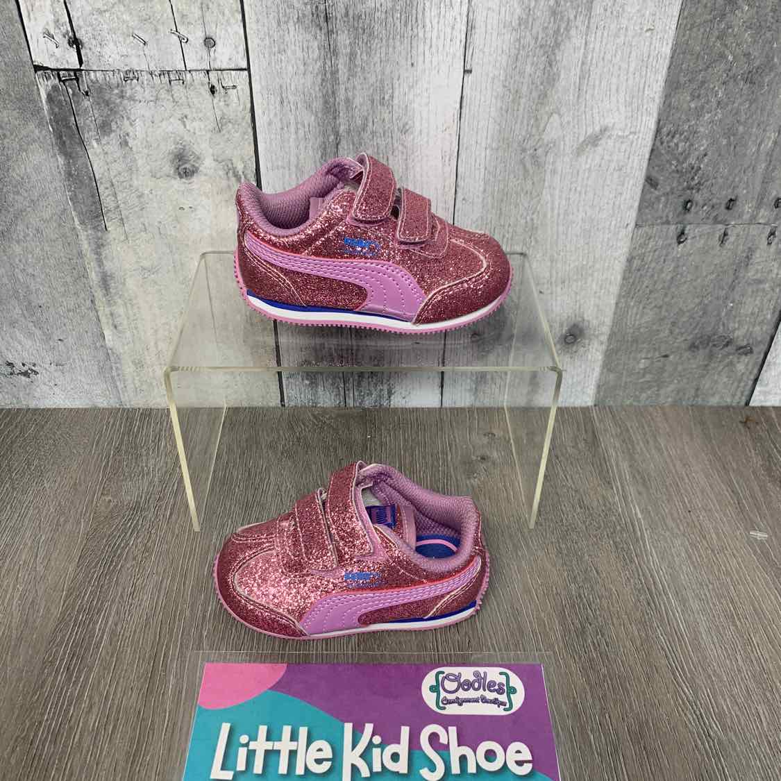 Size 4 Pink/Purple Puma Sneakers