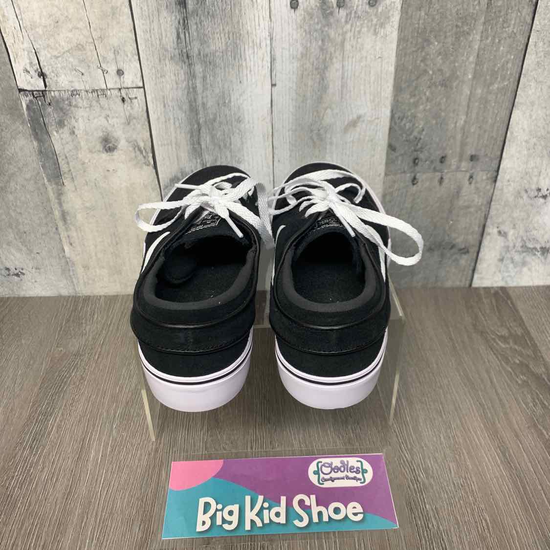 Size 4 Black/White Sport Brand Sneakers
