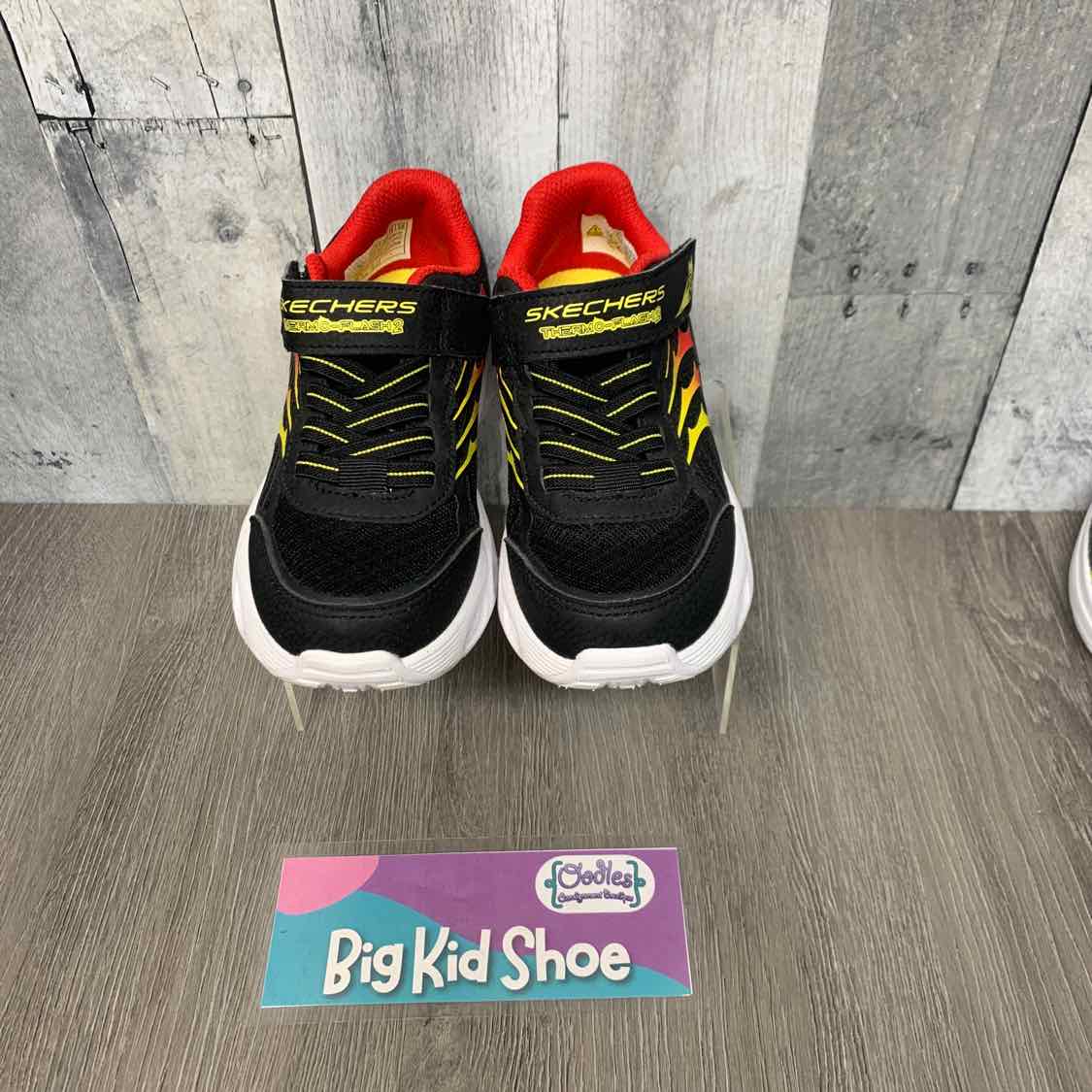 Size 12 Black/Red Skechers Sneakers