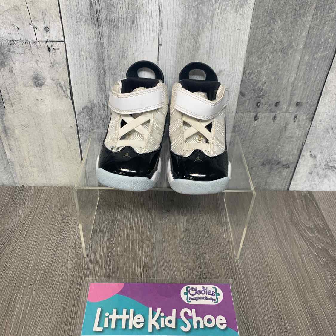 Size 5 Black/White Sport Brand Sneakers
