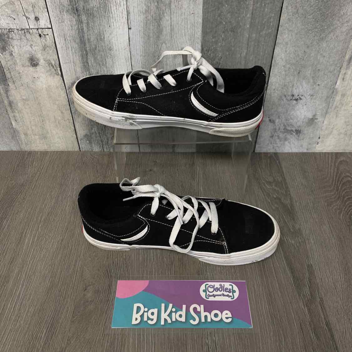 Size 7 Black/White Vans Sneakers