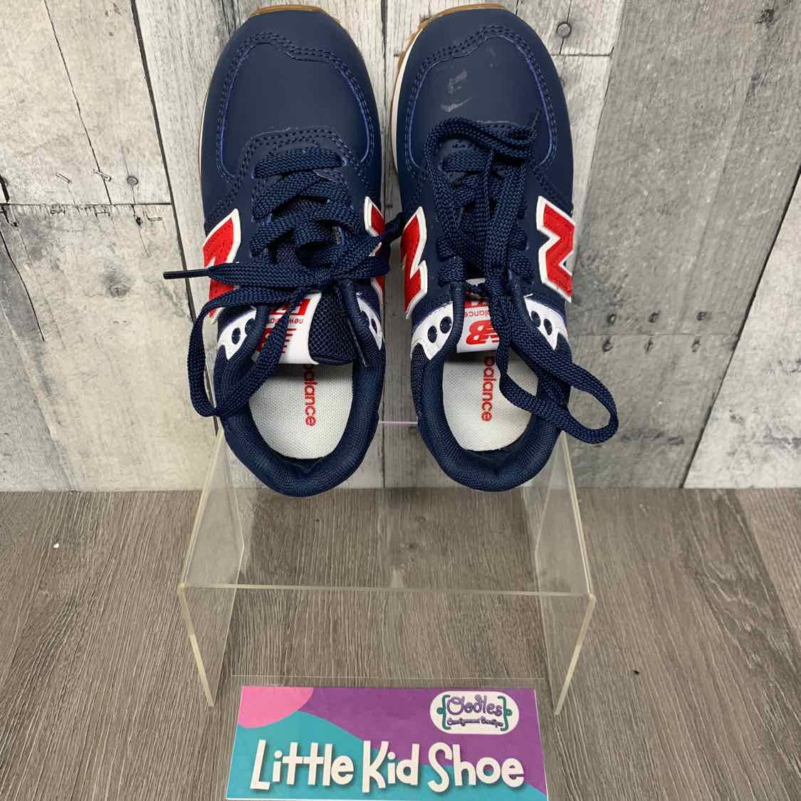 Size 12 Navy/Red New Balance Sneakers