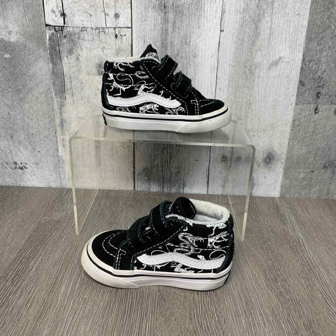 Size 4 Black/White Vans Sneakers