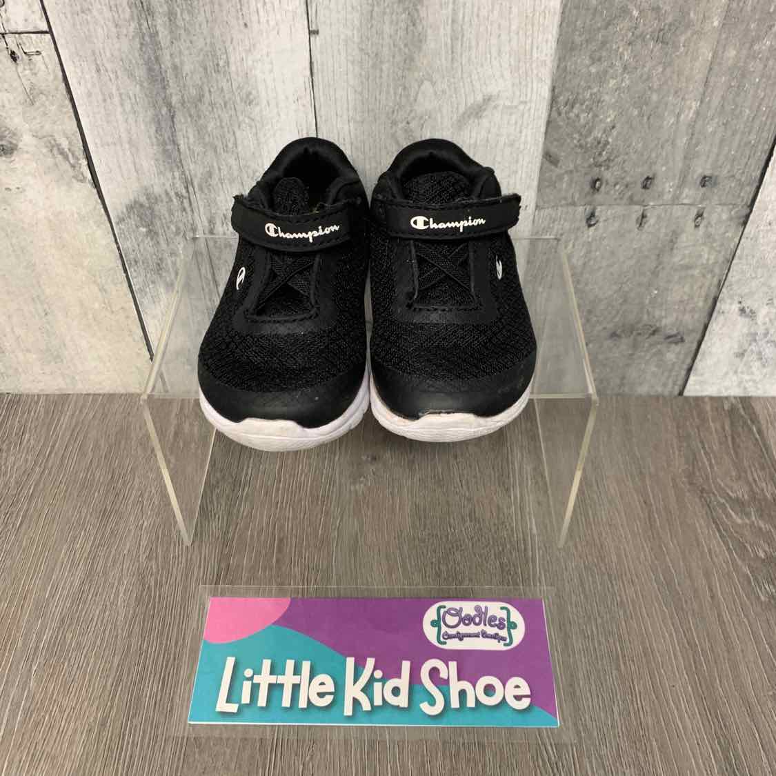 Size 4 Black/White Champion Sneakers