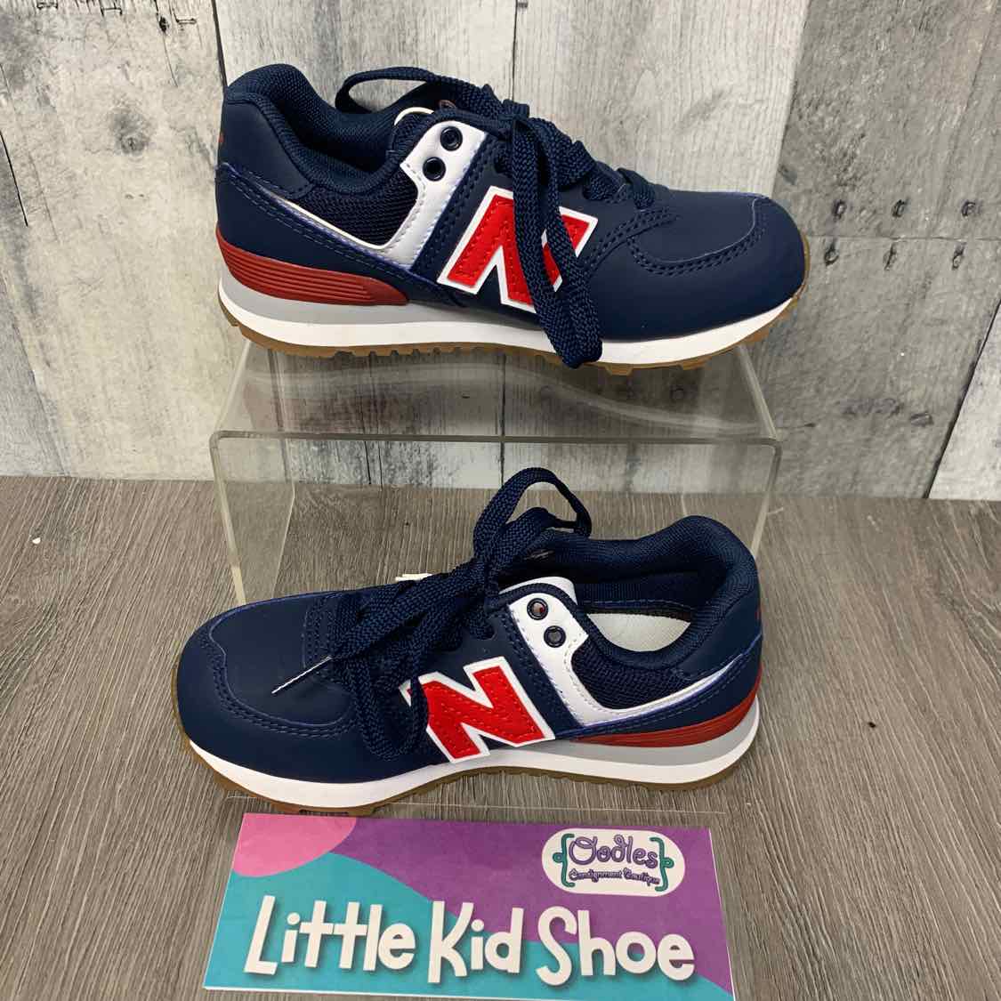 Size 12 Navy/Red New Balance Sneakers