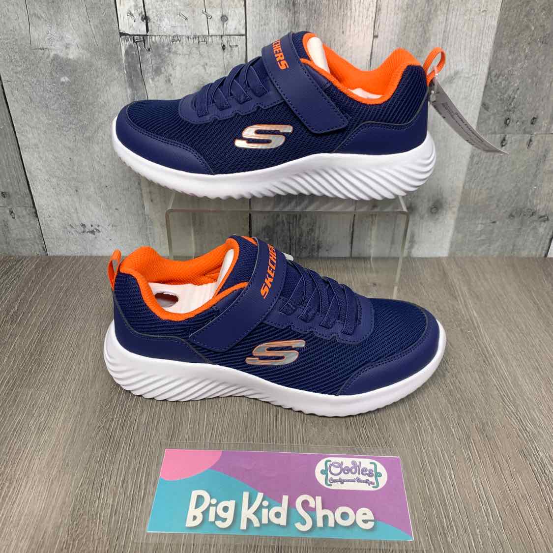 Size 4 Navy/Orange Skechers Sneakers