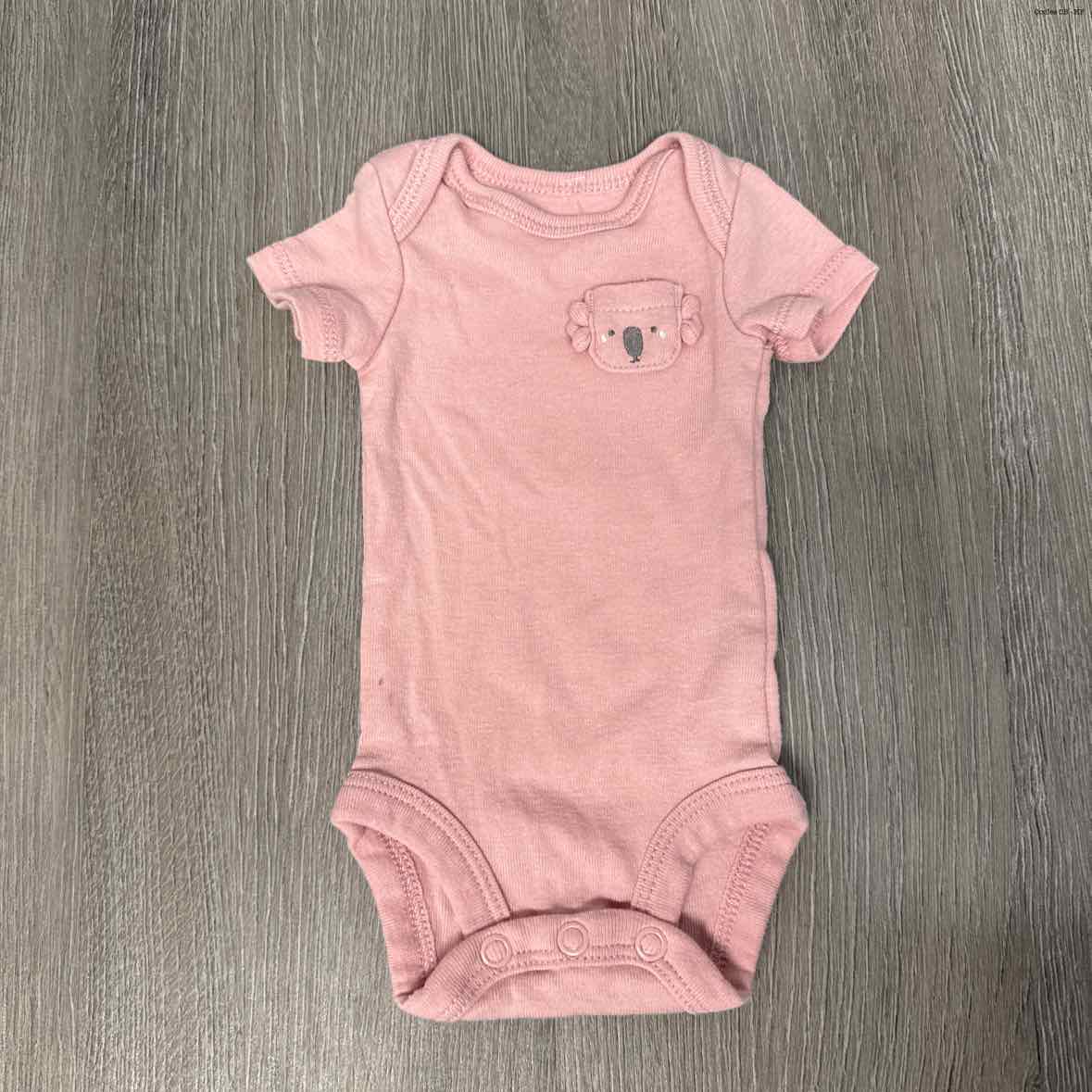 Size Preemie Pink Carter's Bodysuit
