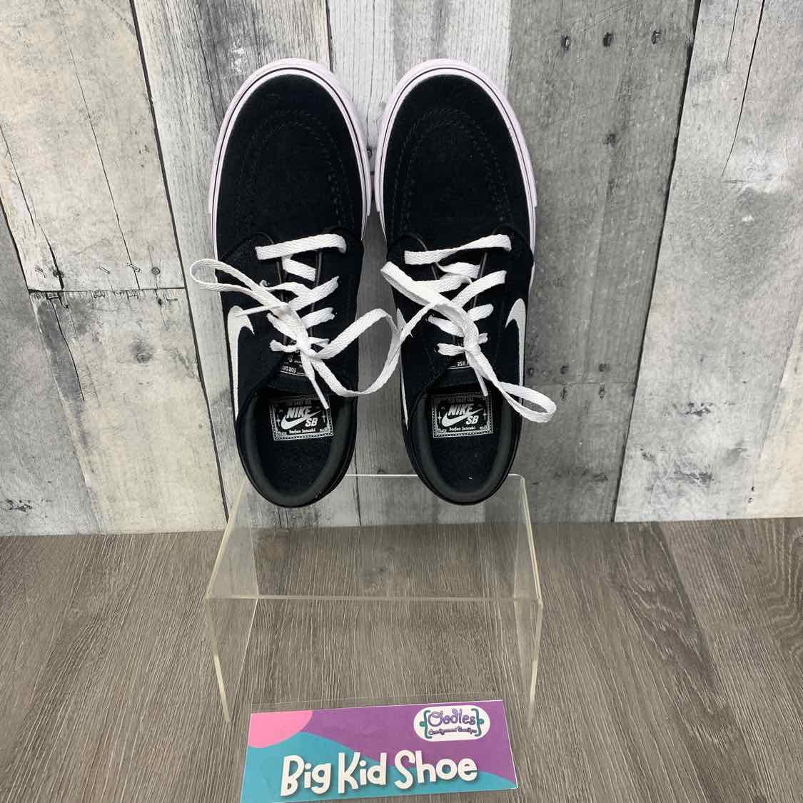Size 4 Black/White Sport Brand Sneakers