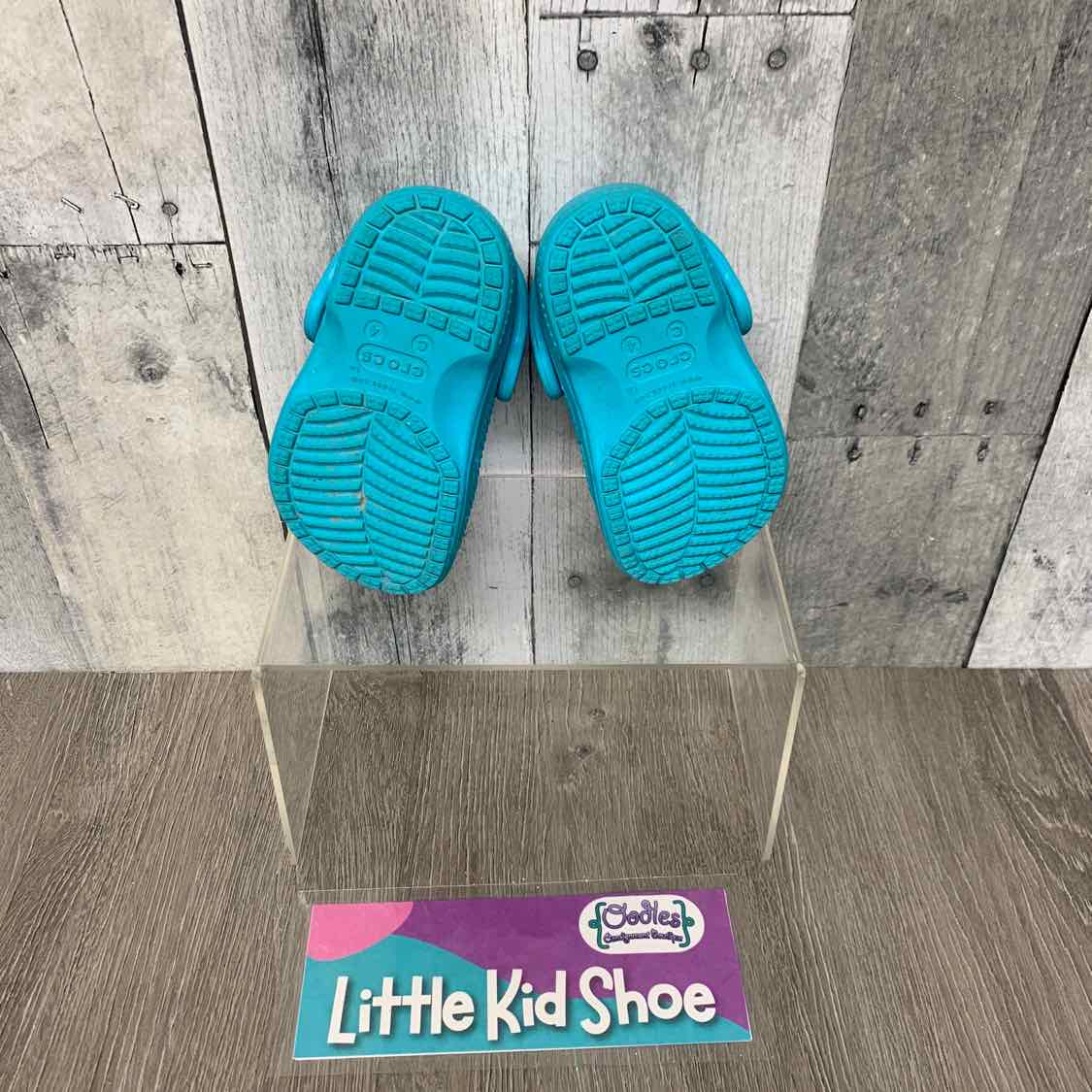 Size 4 Teal Crocs Water Shoes
