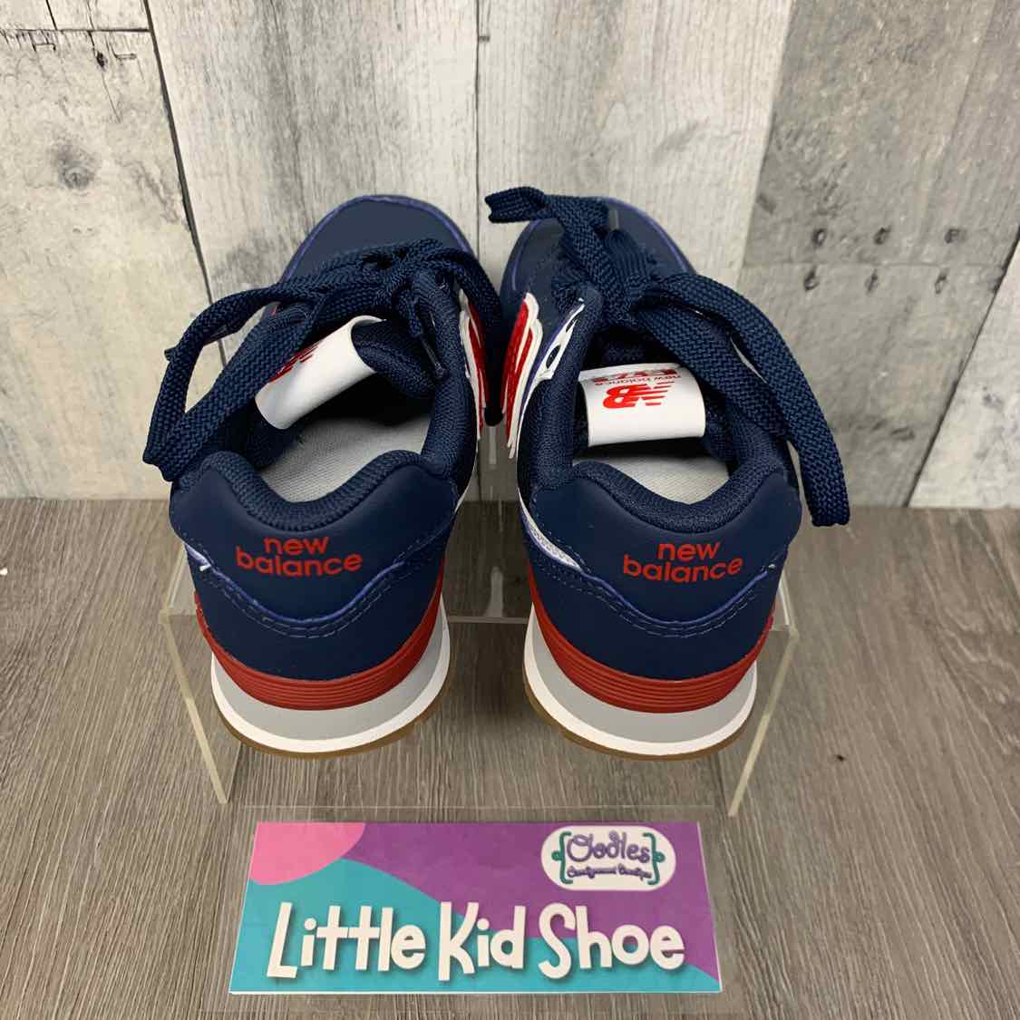 Size 12 Navy/Red New Balance Sneakers