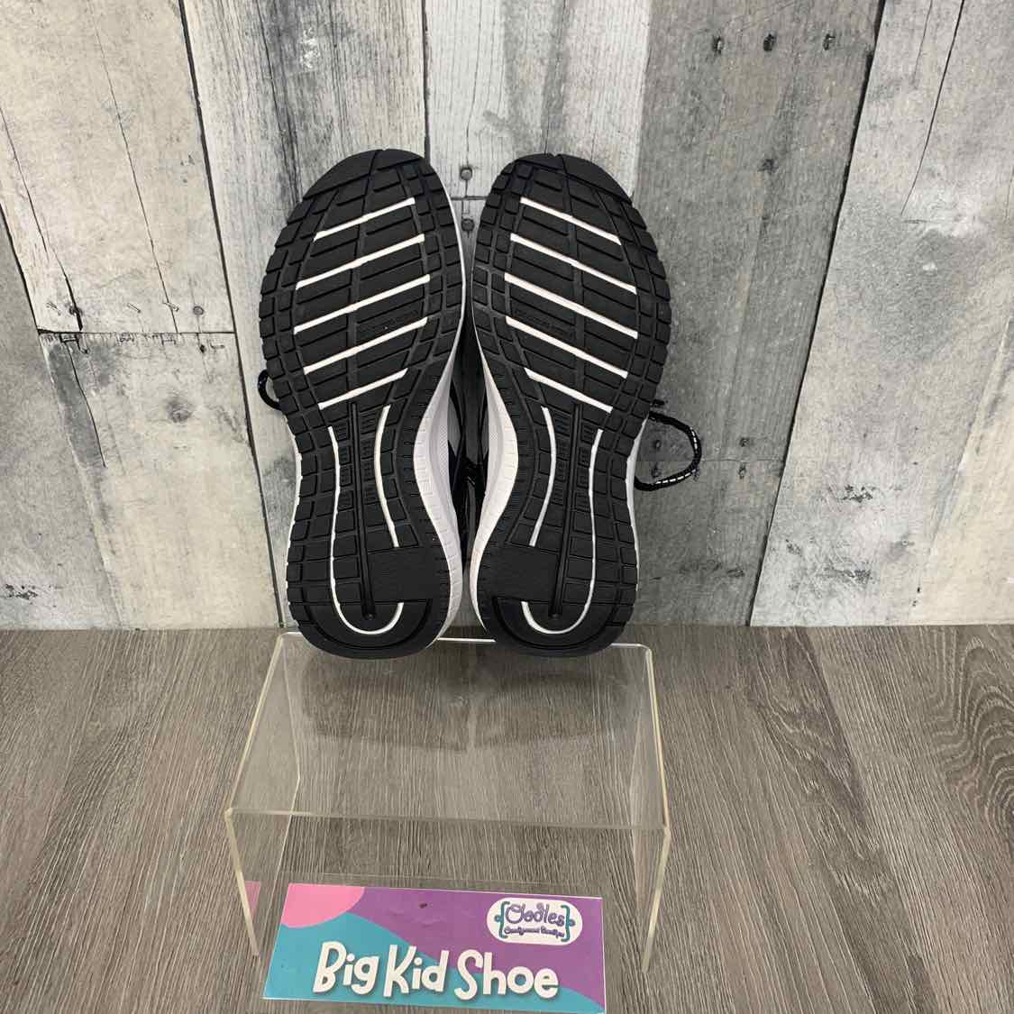 Size 2 Black/White Reebok Sneakers