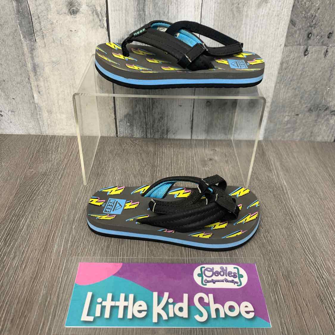 Size 7/8 Gray/Yellow Reef Sandals