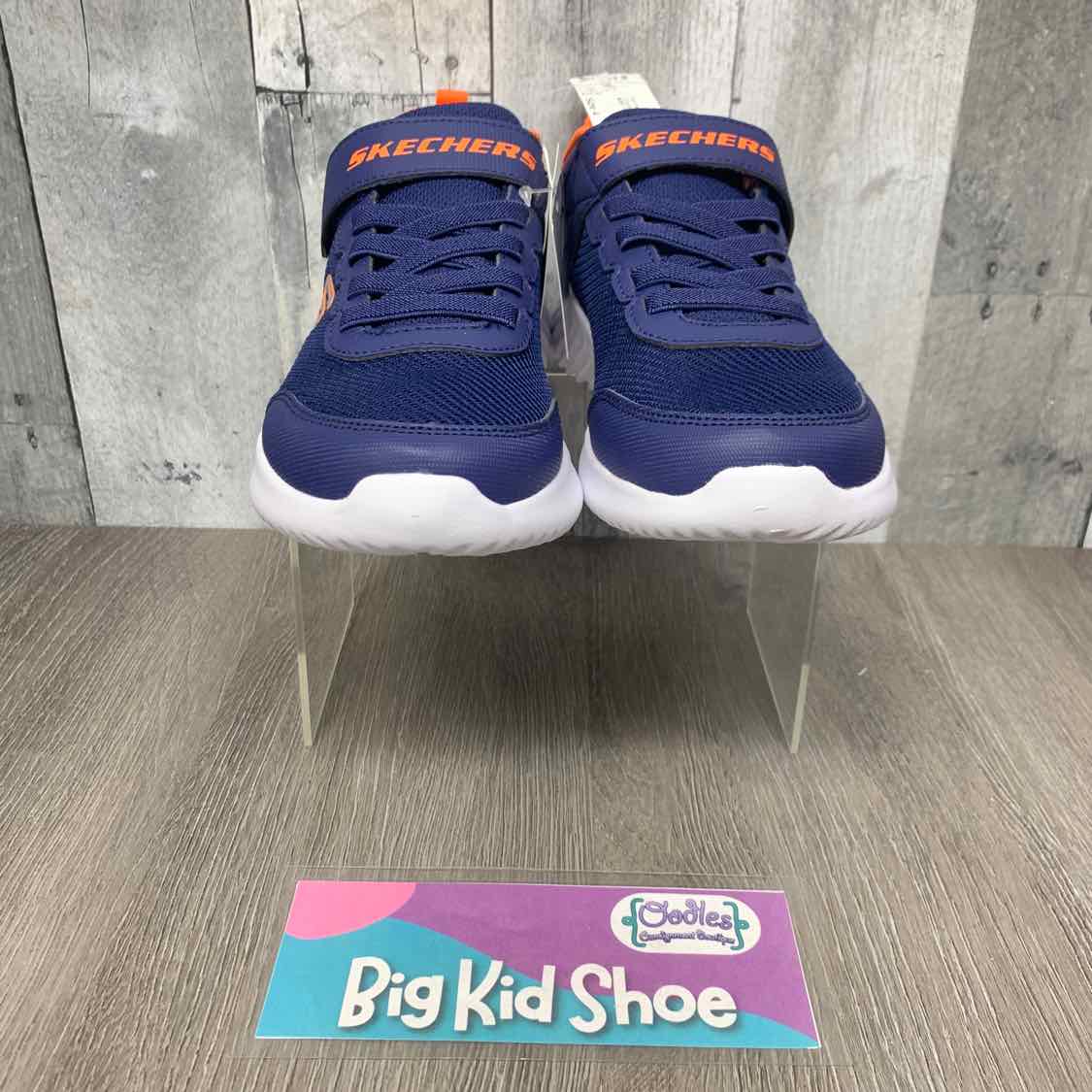 Size 4 Navy/Orange Skechers Sneakers