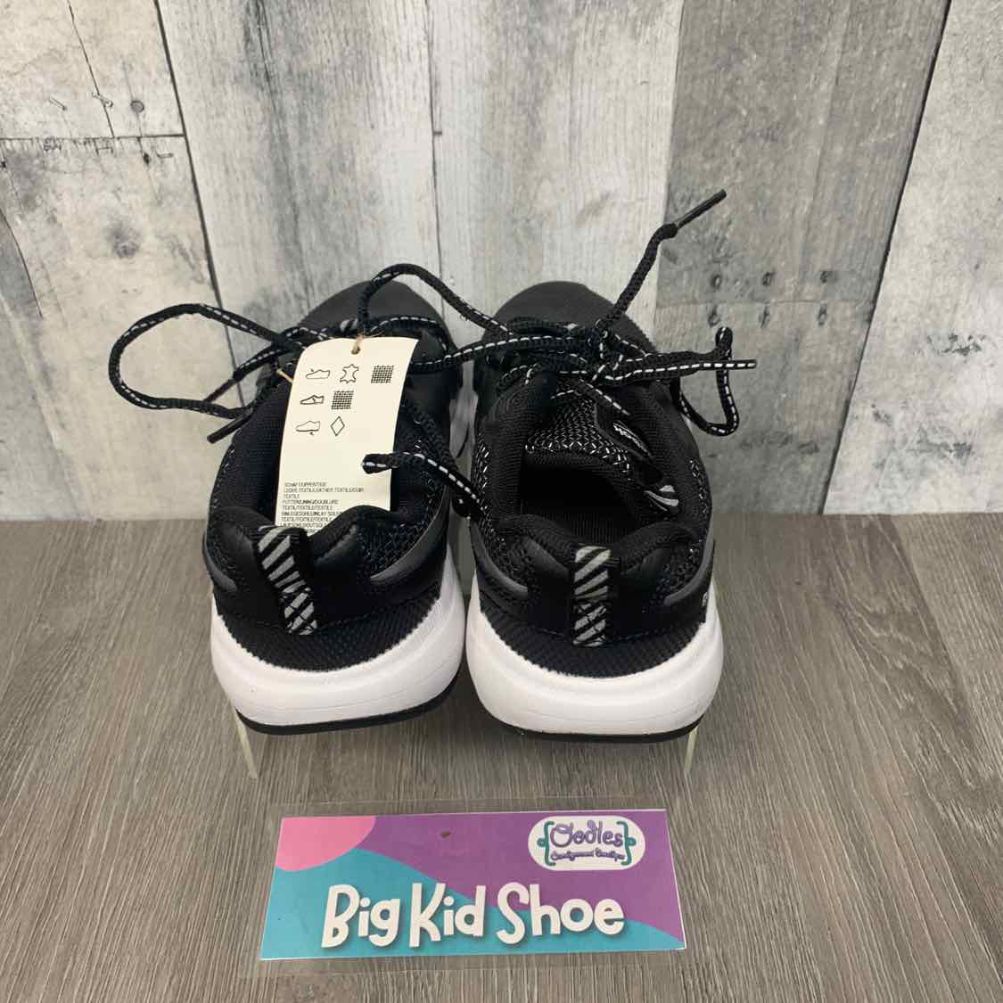 Size 2 Black/White Reebok Sneakers