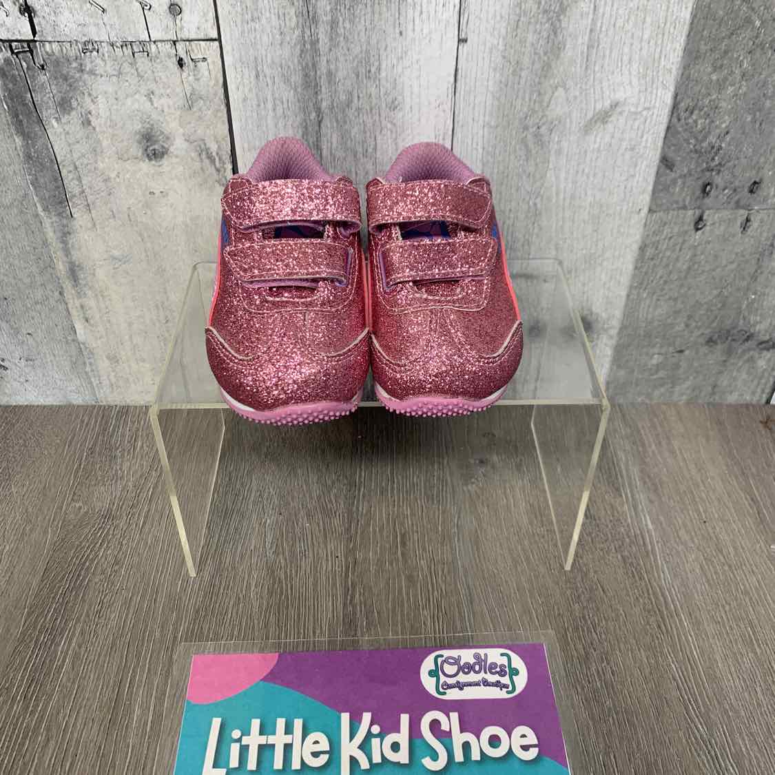 Size 4 Pink/Purple Puma Sneakers