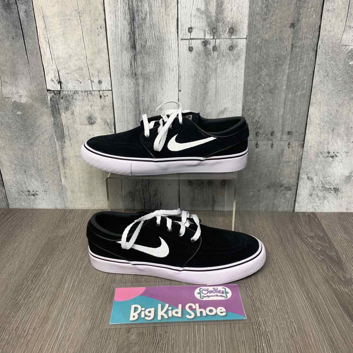 Size 4 Black/White Sport Brand Sneakers