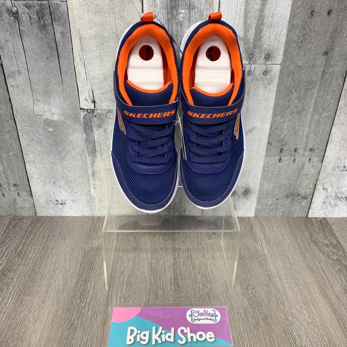 Size 4 Navy/Orange Skechers Sneakers