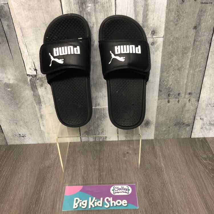 Size 3 Black/White Puma Sandals