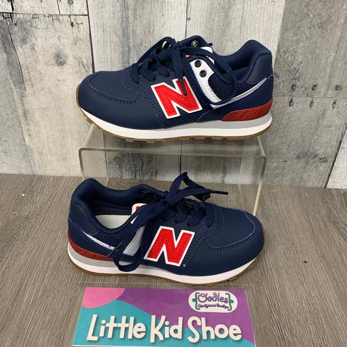 Size 12 Navy/Red New Balance Sneakers
