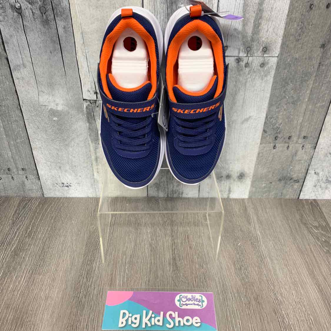 Size 4 Navy/Orange Skechers Sneakers