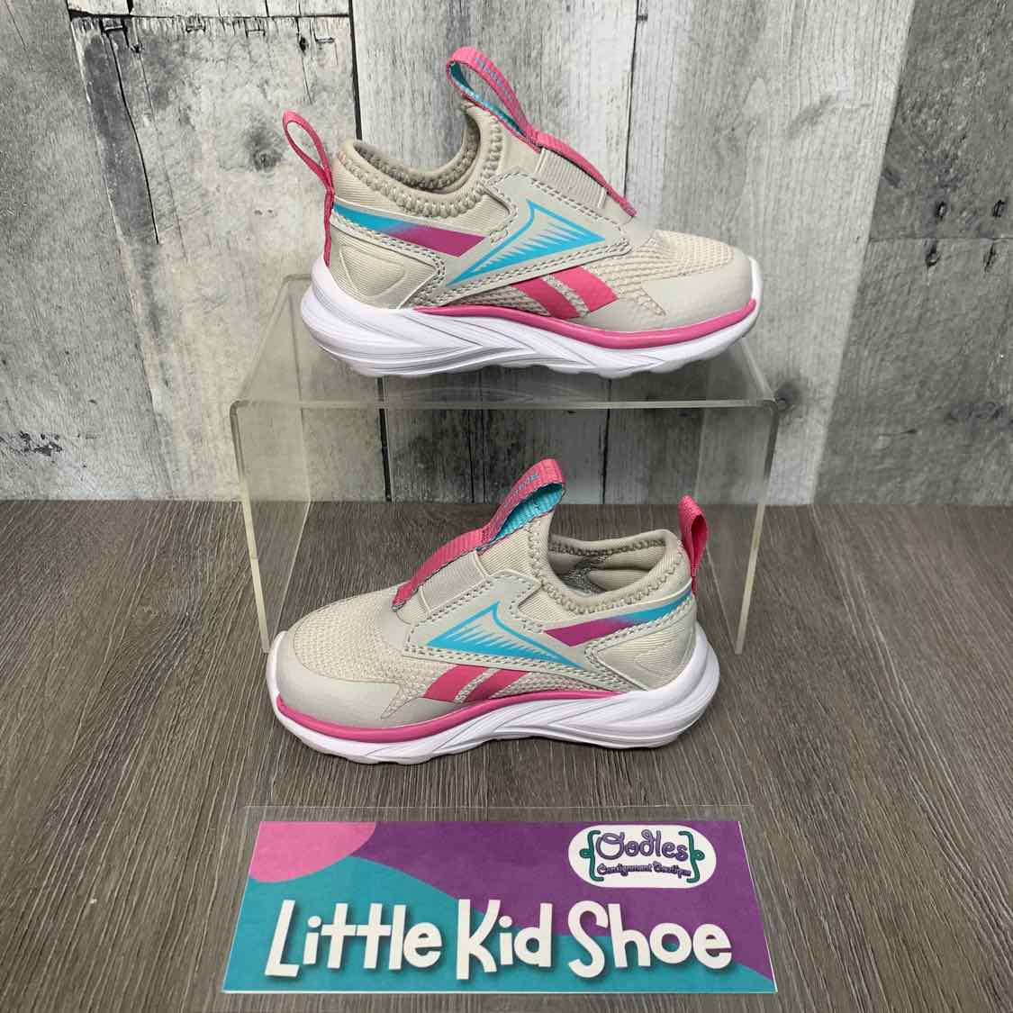 Size 6 Gray/Pink Reebok Sneakers