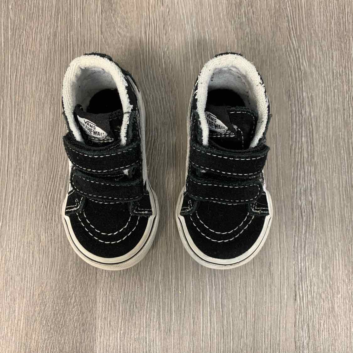 Size 4 Black/White Vans Sneakers