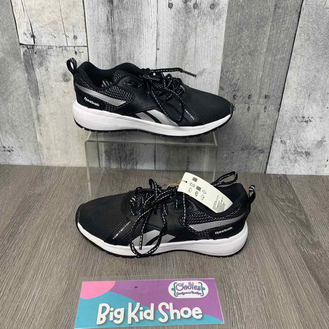 Size 2 Black/White Reebok Sneakers