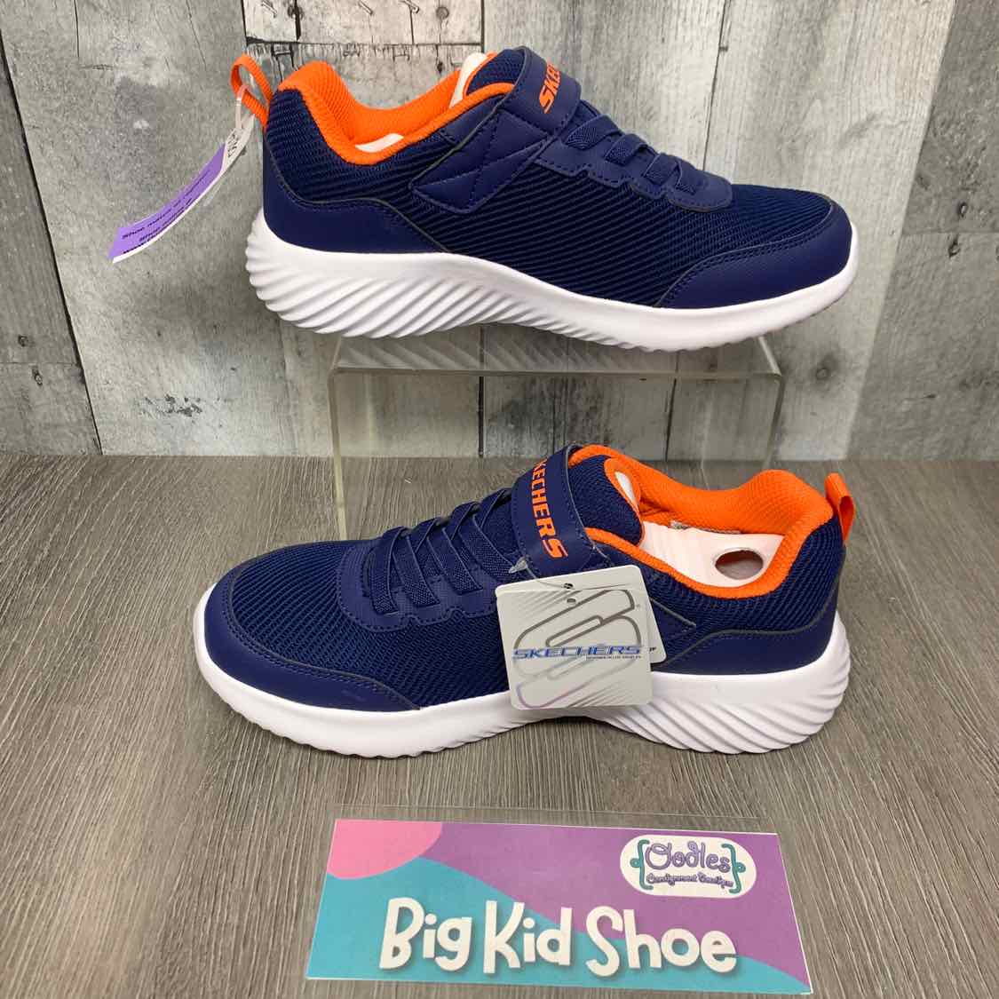 Size 4 Navy/Orange Skechers Sneakers