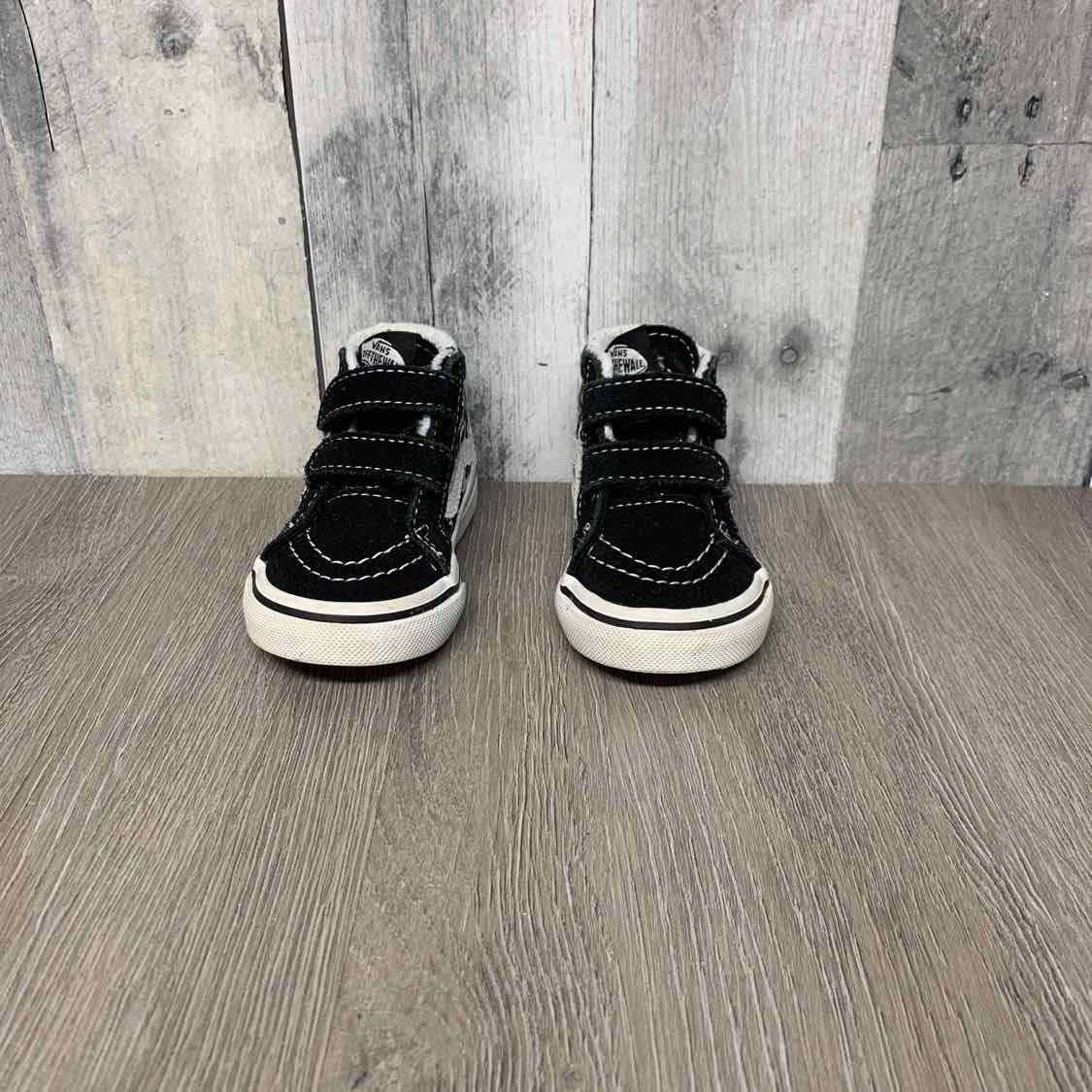 Size 4 Black/White Vans Sneakers