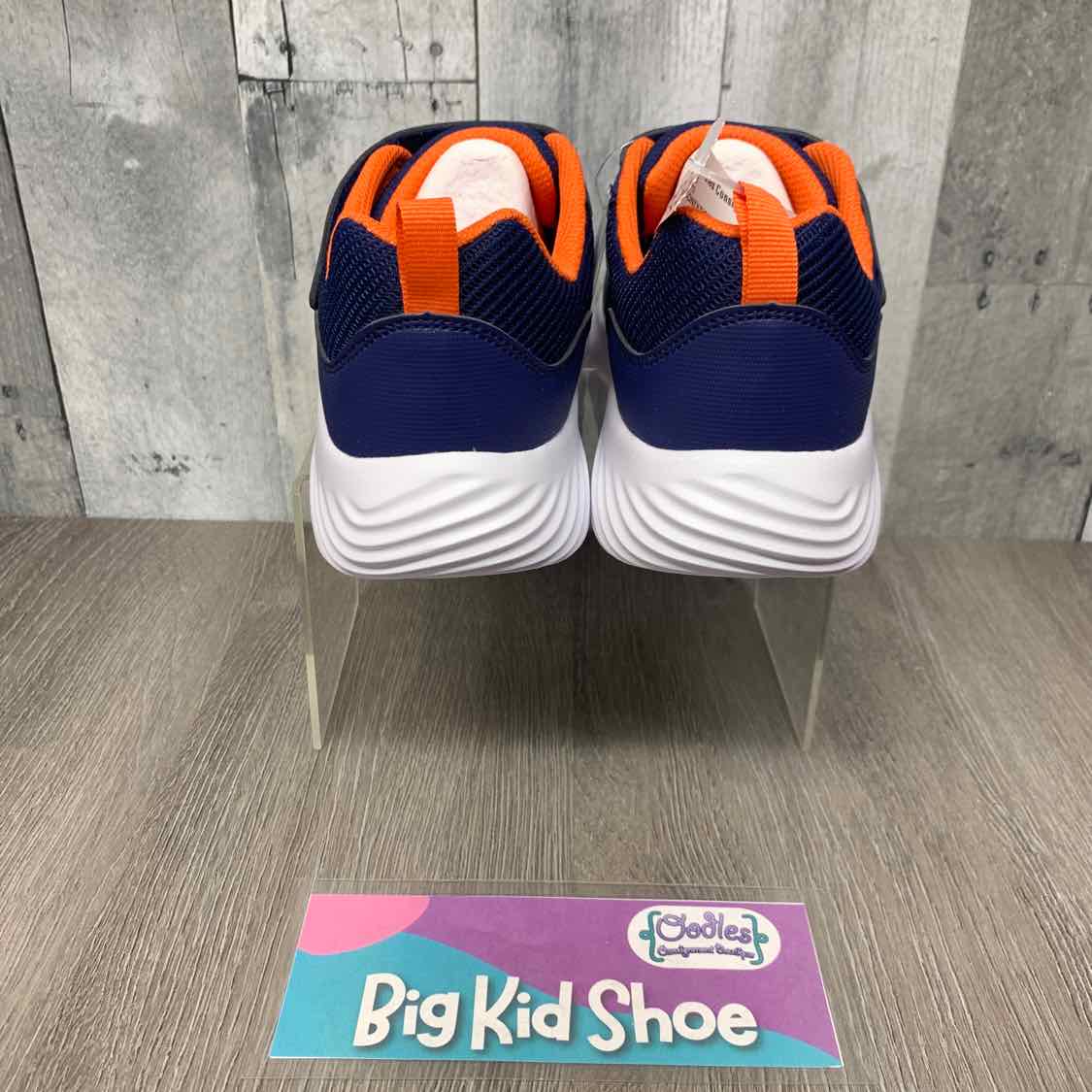 Size 4 Navy/Orange Skechers Sneakers