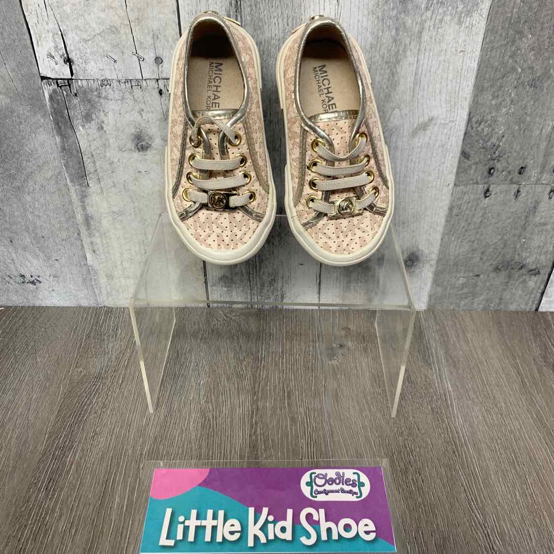 Size 6 Pink/Gold Michael Kors Sneakers