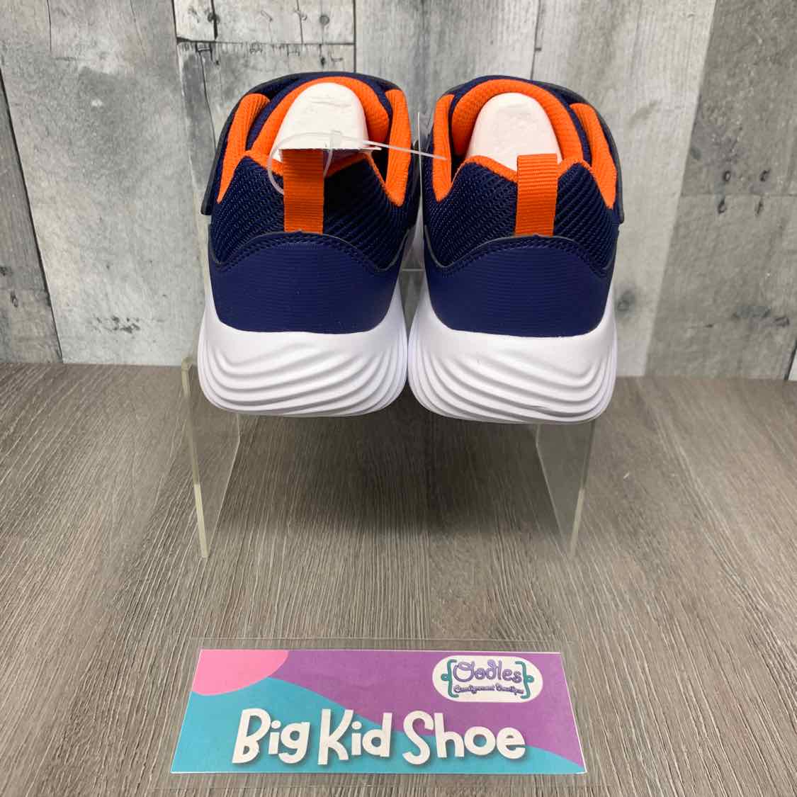 Size 4 Navy/Orange Skechers Sneakers