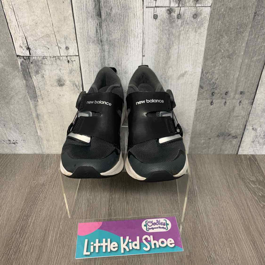 Size 12 Black/White New Balance Sneakers