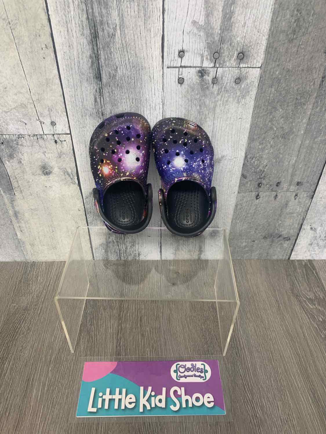 Size 5 Black Graphic Crocs Water Shoes