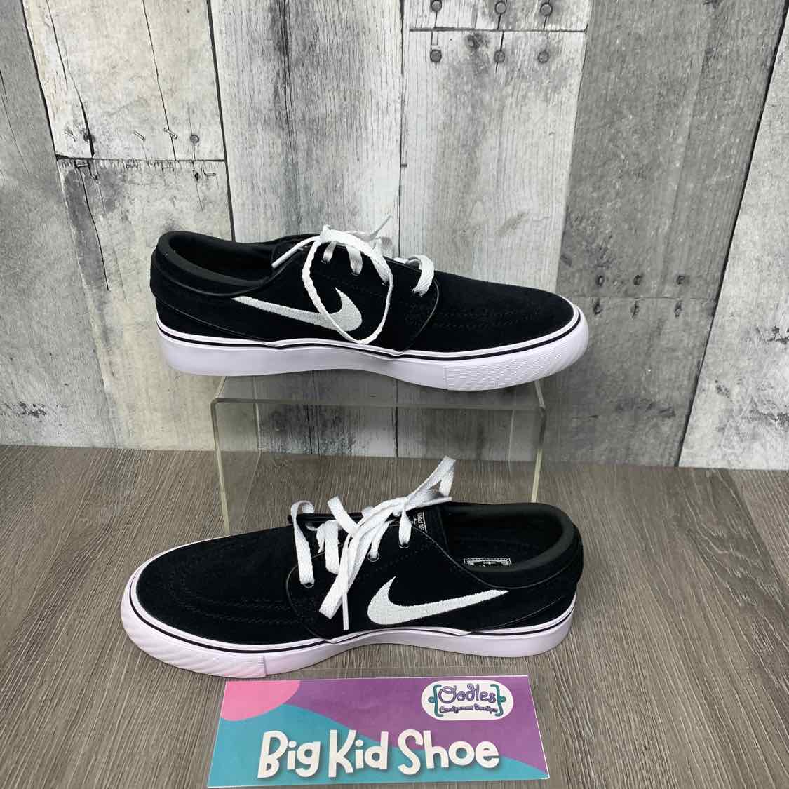 Size 4 Black/White Sport Brand Sneakers